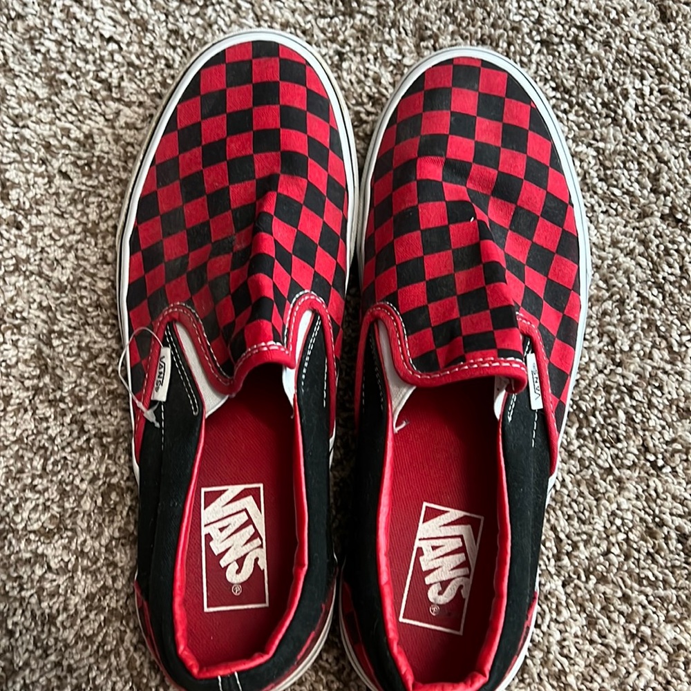 Red and black checkered Vans